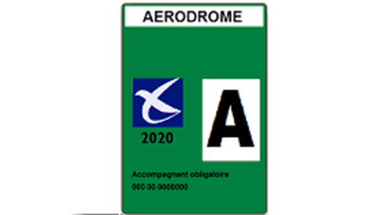 Photo d'un badge TCA Vert